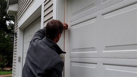 how to repair garage door side stripping